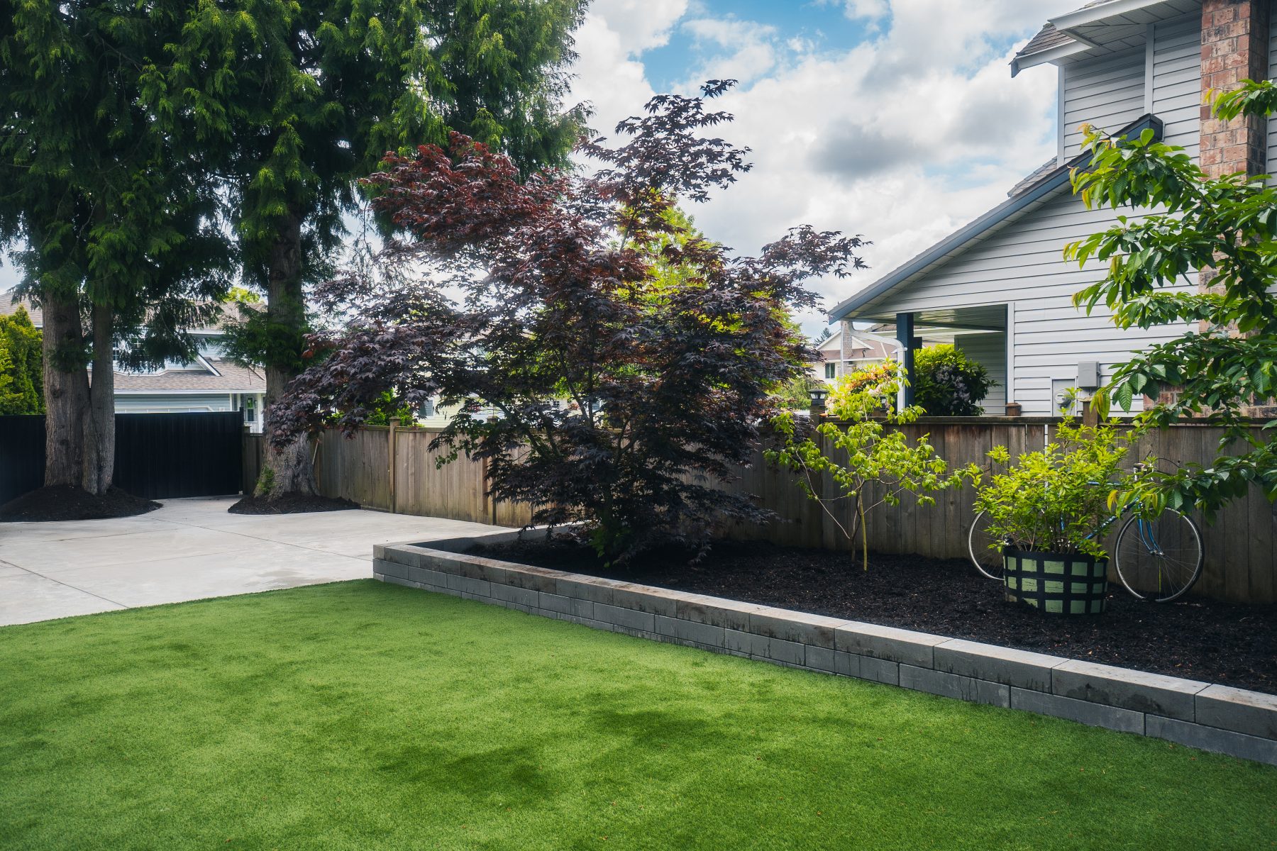 Completed residential concrete flatwork with clean edges and finished surface